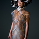 Image for article titled Robotic dresses that will mix drinks for you, then turn transparent